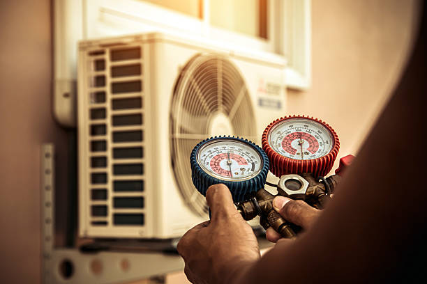 Professional Hvac technician working in Brooksville, MS